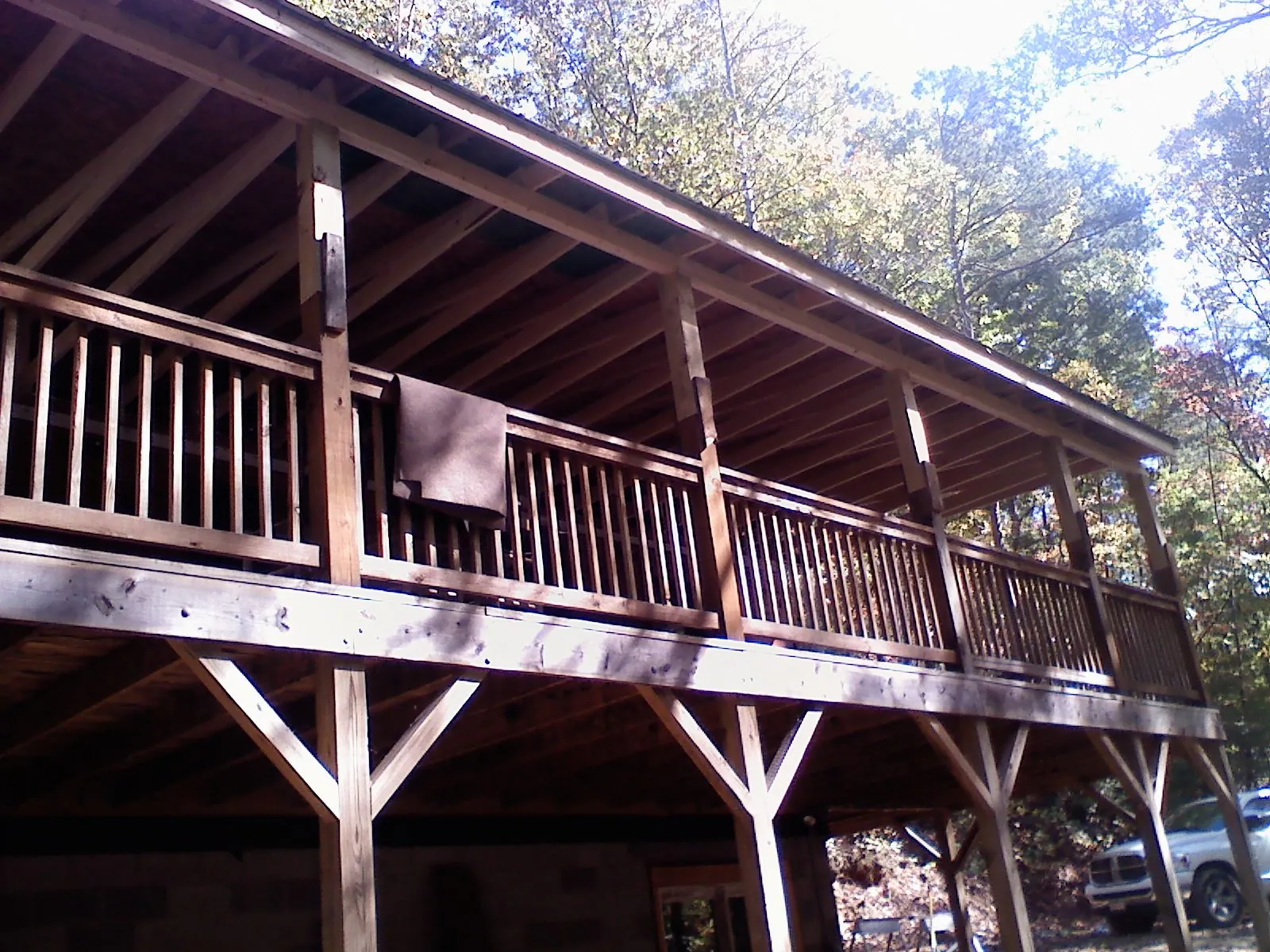 Timber framing under a new elevated porch and deck — Roof Leak Repair in Cincinnatus by Roofing Brothers